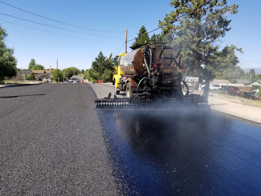 car-laying-asphalt